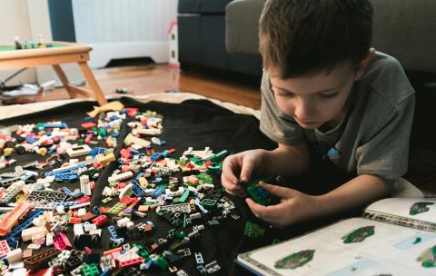 Child playing with legos